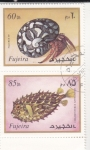 Stamps United Arab Emirates -  molusco y pez