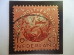 Stamps Netherlands -  75 Aniversario de la U.P.U. 1874-1949 (Unión Postal Universal) - Glogo con Cornetas de Correo