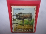 Stamps : Africa : Angola :  GNU - Gorgon Taurinus - Serie: Fauna Africana- Sello de 4 Angolar Angoleño.