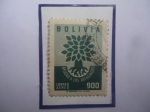 Stamps : America : Bolivia :  Año Mundial de los Refugiados- Emblema- Sello de 900 Bolivianos de Bolivia, año 1960