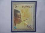 Sellos de Africa - Rwanda -  Año Internacional del Discapacitado - Niño Dibujando con la boca- Dibujo Infantil.