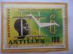 Sellos de America - Antillas Neerlandesas -  Prisionero tras las rejas-25 Aniversario de Amnistía Internacional 1961/86.