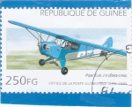 Stamps Guinea -  avioneta Piper cub j-3