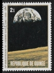 Stamps Guinea -  Lunar soil and Earth
