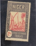 Stamps : Africa : Niger :  Nativo extrayendo agua