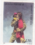 Stamps Romania -  Bombero salvando a un niño