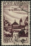Stamps Morocco -  Avión cuatrimotor sobrevolando la ciuda de Moulay Idriss.