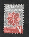 Stamps : Europe : Belarus :  758 - Ornamento rojo sobre fondo gris