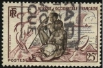 Stamps France -  África Occidental Francesa. Pareja de indígenas, animales africanos y canoa a vela.