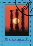 Sellos de Asia - Emiratos �rabes Unidos -  1970 Ajman: Cabo Kennedy, el Sol tras las torres de lanzamiento