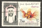 Stamps United Arab Emirates -  umm al qiwain, jeque y un pez