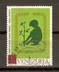 Stamps : America : Venezuela :  NIÑO  PLANTANDO  UN  ÁRBOL