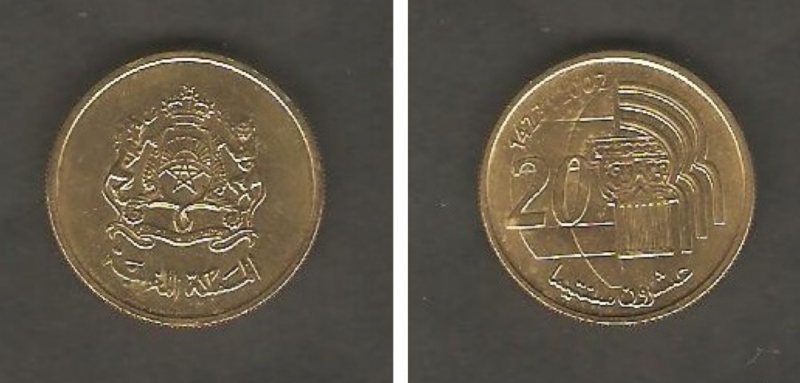 Escudo de armas real y Capitel