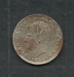 Juan Carlos I y Escudo Nacional