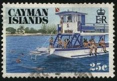 Islas Caimán. Turistas buceando.