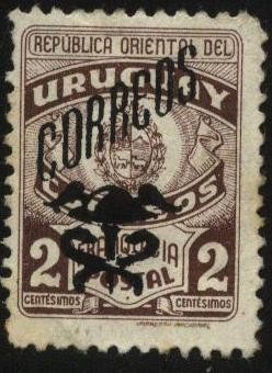 Escudo Nacional. Sello de franquicia postal sobrecargado CORREOS con pétaso alado y el caduceo.