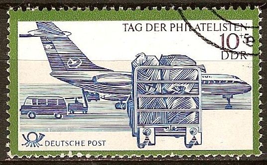 Dia de los filatelistas.Avion de aireolineas y carro de aquipaje (DDR)