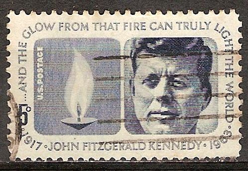 John Fitzgerald Kennedy  y el resplandor de esa llama podrá en verdad iluminar al mundo.