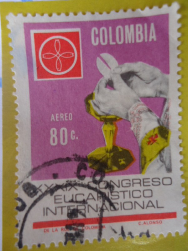 XXXIX Congreso Eucarístico Internacional - Manos del Sacerdote y Emblema del Congreso.