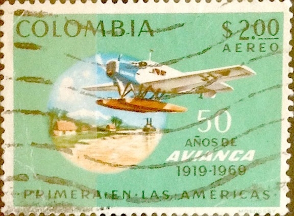 Intercambio 0,20 usd 2 pesos 1969