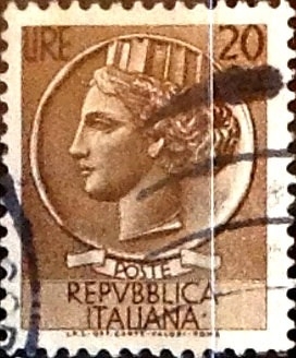 Intercambio 0,20 usd 20 liras 1955