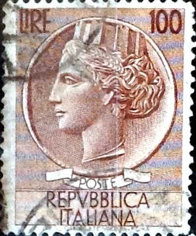 Intercambio 0,20 usd 100 liras 1956