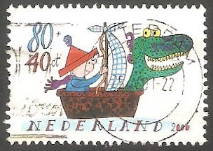 1804 - Niño en un barco, con cabeza de animal en la proa