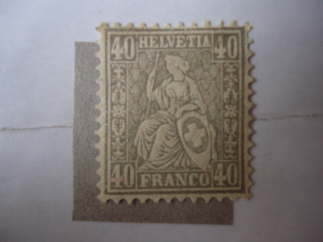 Helvecia sentada con Escudo 1862/83.