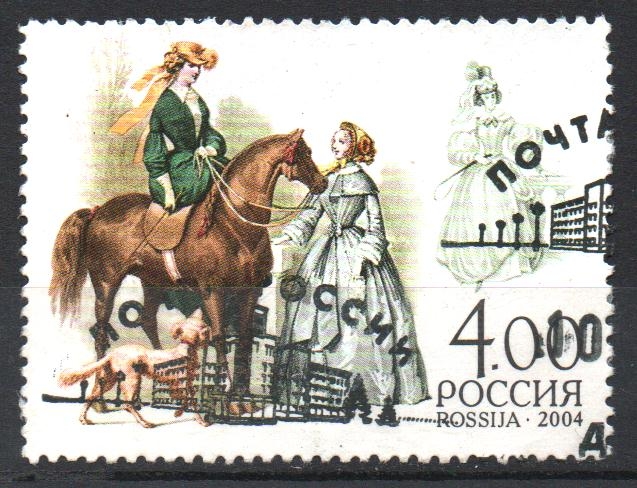 TRES  MUJERES,  CABALLO  Y  PERRO.