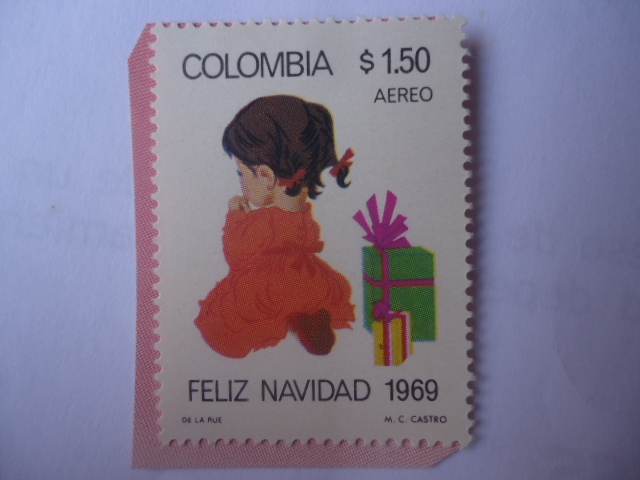Navidad 1969 - Niño con regalos de Navidad