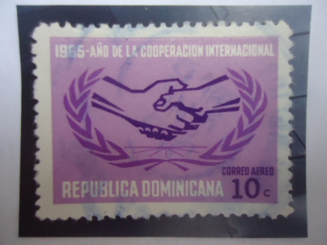 1965 Año de la Cooperación internacional -  Apretón - Emblema