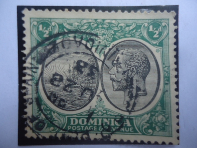 Dominica Postage y Revenue - King George V - Serie:Sello de la Colonia - valor 1/2 Penique Británico