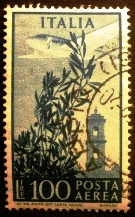 Olive tree, airplane and tower of Campidoglio