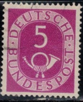  Corneta postal y cifra.