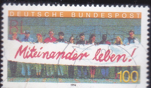 Manifestantes con pancarta