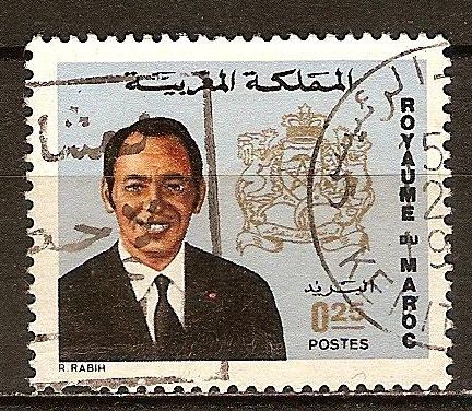 El Rey Hassan y escudo de Armas.