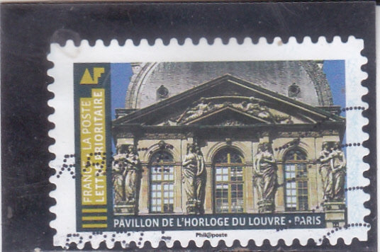 PEBELLÓN DE L'HORLOGE DU LOUVRE-PARIS 